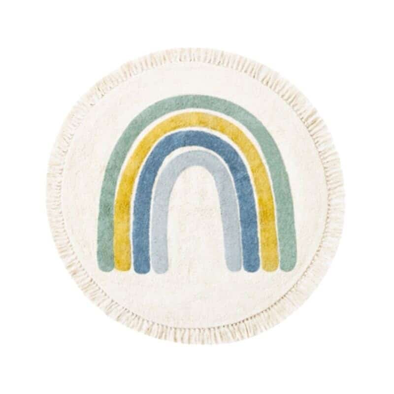 Tapis rond bleu à franges avec un arc-en-ciel