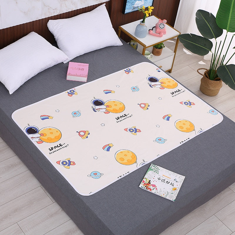 Tapis à langer portable avec une dessin de lune