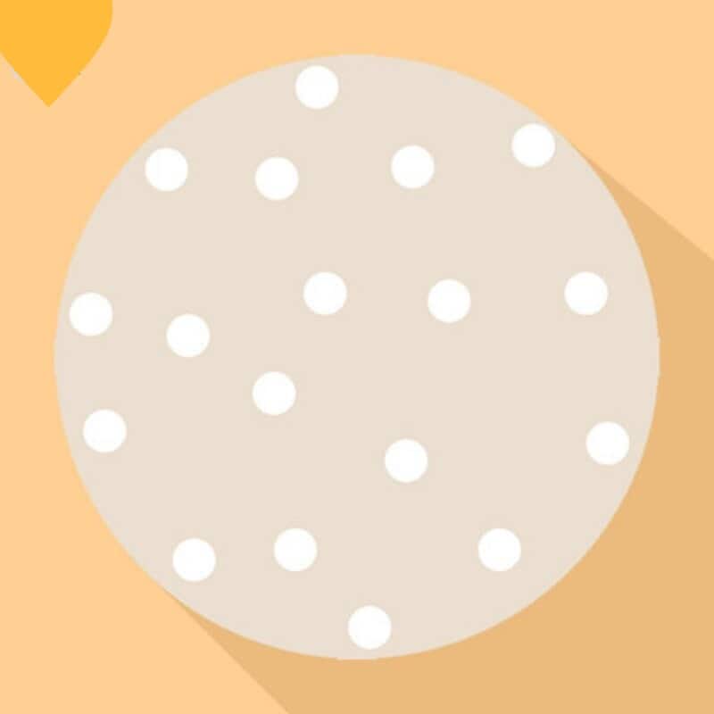 Tapis jaune rond pour chambre d'enfant avec des ronds blancs