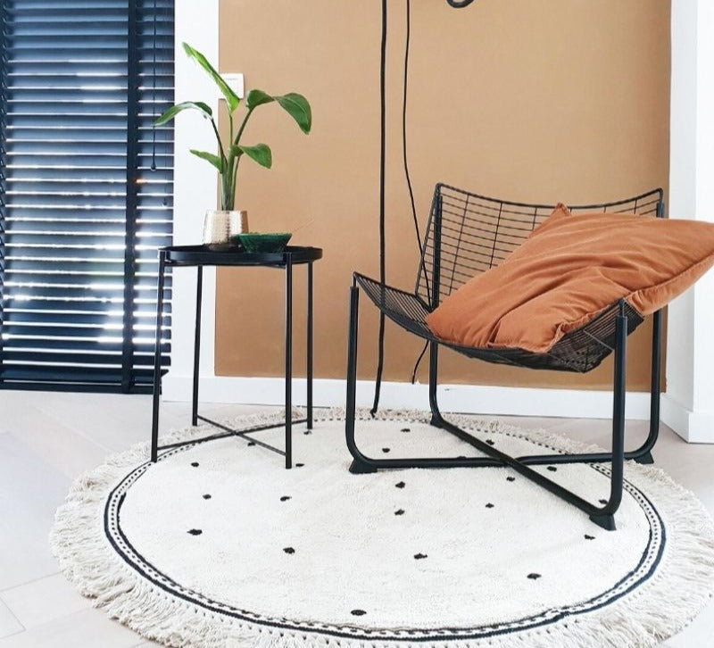 Tapis rond noir à franges pour chambre d'enfant