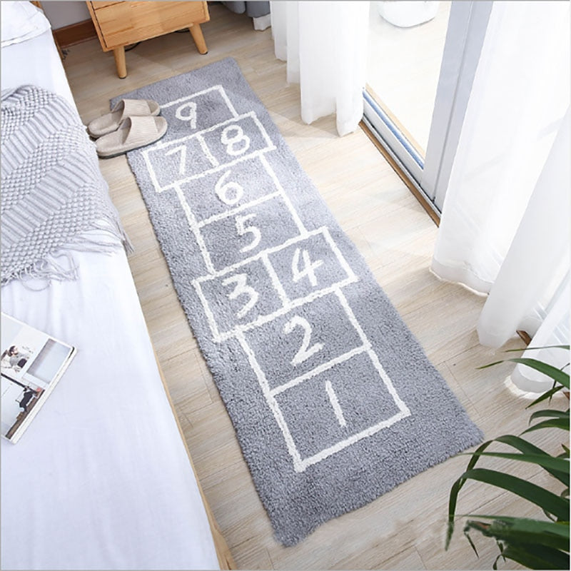 Tapis marelle gris pour chambre d'enfant