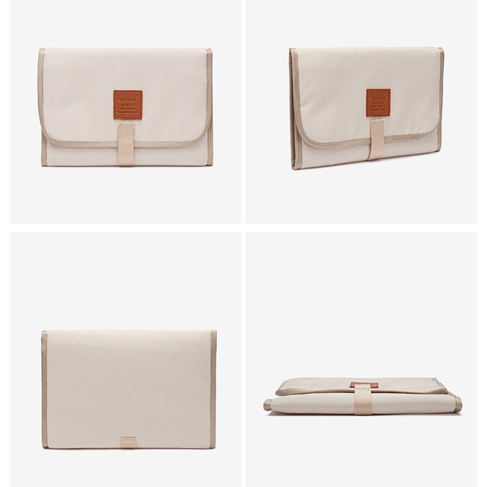 Tapis à langer portable blanc