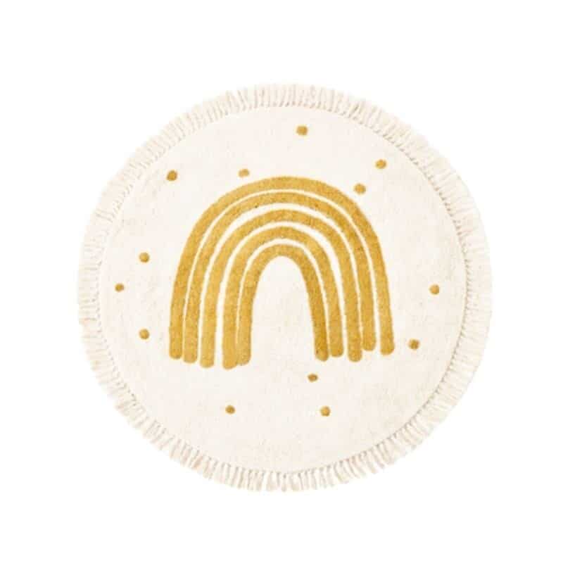 Tapis rond jaune à franges avec un arc-en-ciel