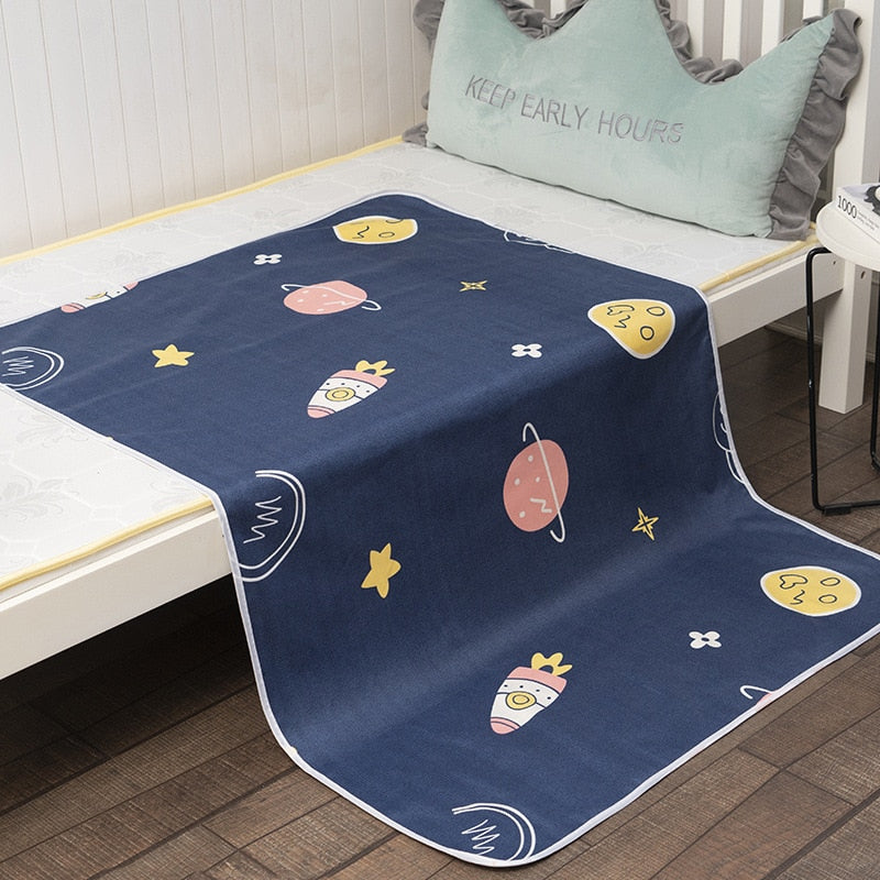 Tapis à langer portable en forme de planète