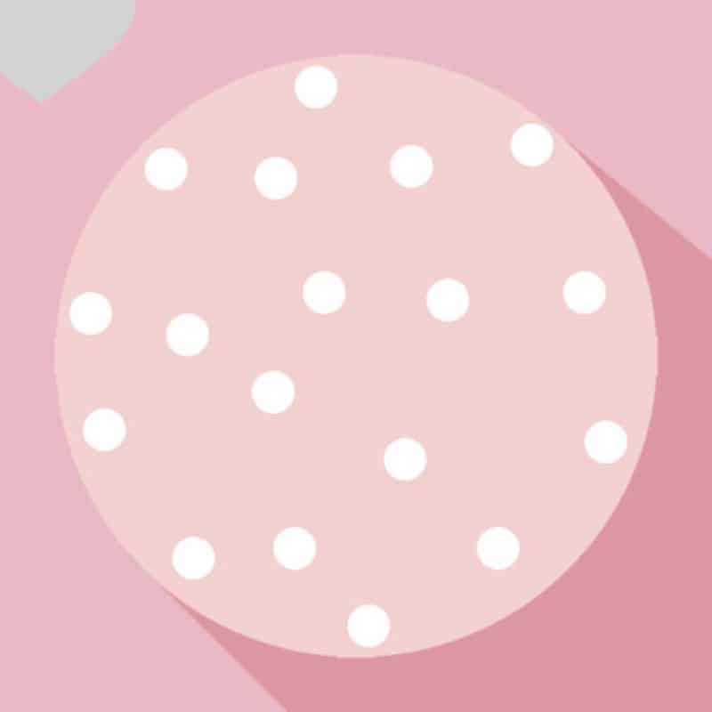 Tapis rose rond pour chambre d'enfant avec des ronds blancs